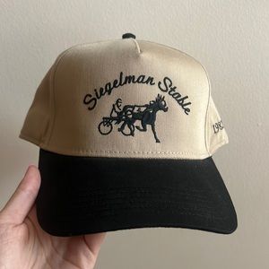 Siegelman Stable hat